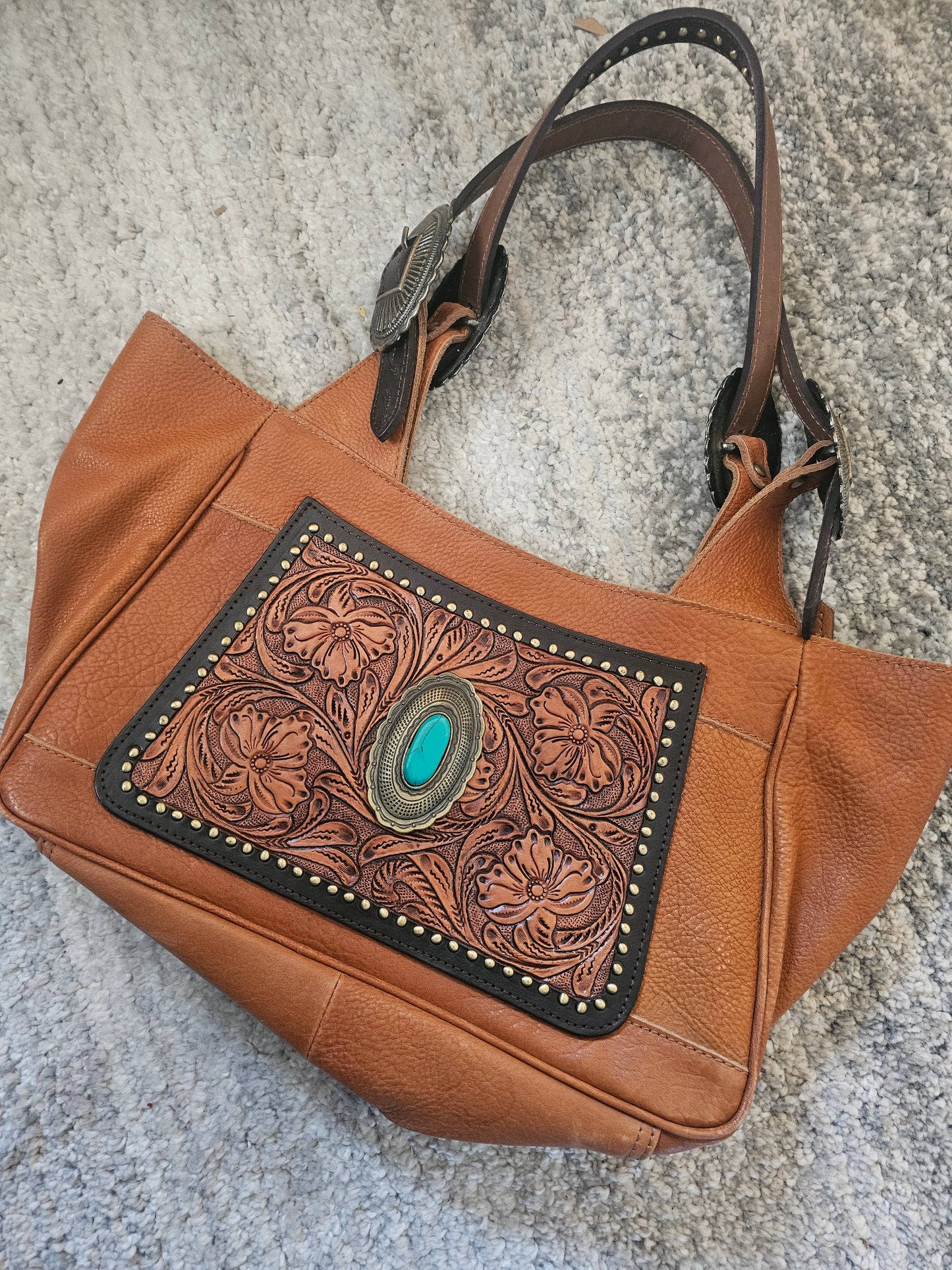 Tooled sling purse